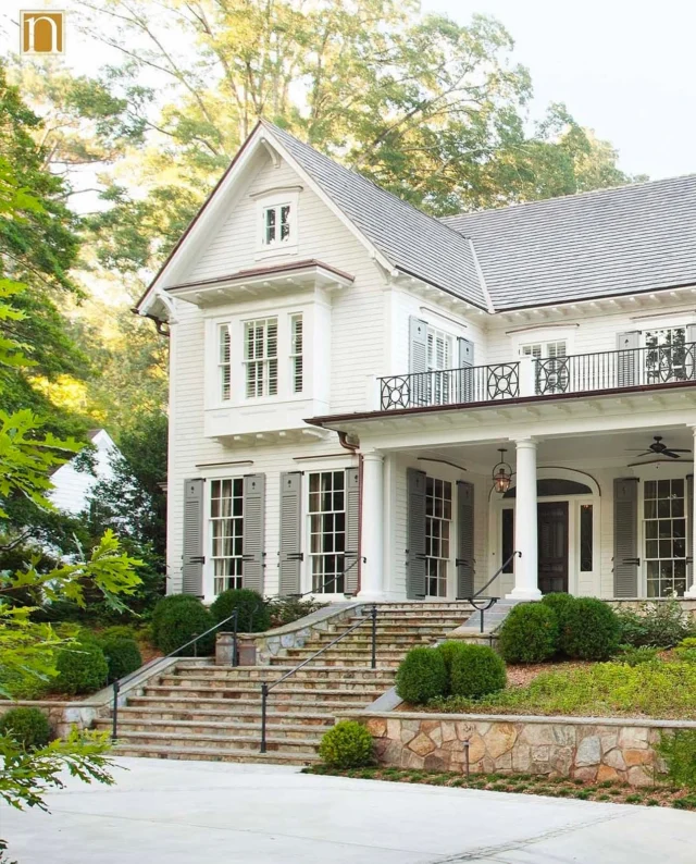 @frankneelydesign went to great measures to honor the architectural styles of the surrounding homes in this established Atlanta neighborhood. This new build is situated on a sloped lot but was designed for easy outdoor living without the need for a flight of stairs to access the back lawn and pool. The subterranean 3-car garage is built under the sprawling lawn that leads out to the pool - every detail thoughtfully designed and implemented. I think the front porch might be my favorite though.

The home was built by @patrickdavey1997 and beautifully captured by @emilyfollowillphotographer 

.
.
.

#atlantahomes #architecturaldesign #architecturaldetail #homedesign #residentialarchitecture #newbuild #timelessdesign #timelesshome #backyarddesign #garagedesign #stonework #frontporch #southernhome